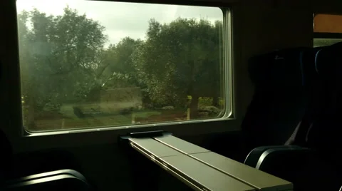 Empty seats on train going fast in the Italian countryside Video stock 58843170