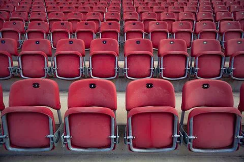 Empty seats without spectators in the stadium Stock Photos