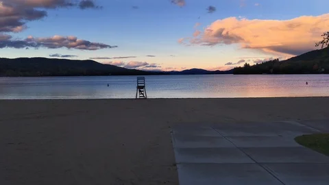 Empty, Serene Lake Beach at Sunset Stock Footage 98415981