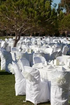 Empty served restaurant table with white tablecloth Stock Photos