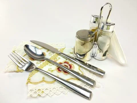 Empty served restaurant table with white tablecloth Stock Photos