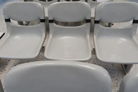 Empty set of chairs inside a building Stock Photos