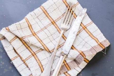 Empty setup with stone, fork and knife Stock Photos
