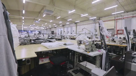 An empty sewing workshop. Panorama of a large sewing workshop. Large sewing Видео 185449636