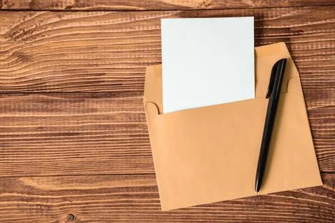 Empty sheet of paper with pen and envelope 스톡 사진