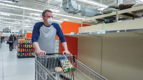 Empty shelves at the grocery store during the Covid-19 Coronavirus pandemic 動画素材 126887606