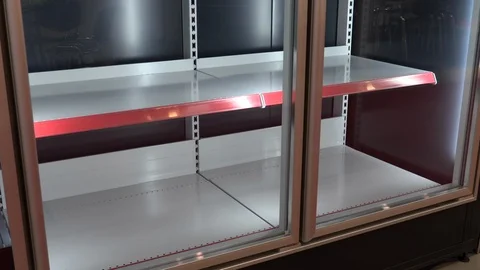 Empty shelves in store refrigeration unit Stock Footage 120308185