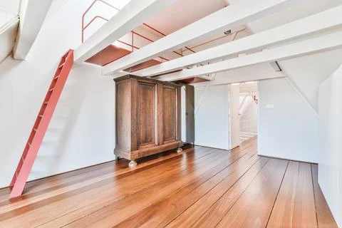 Empty shelves on wall in spacious room Stock Photos