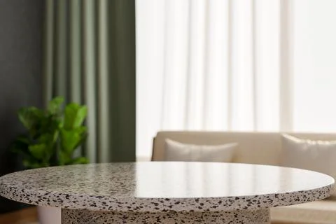 Empty shiny round granite stone table across white sofa in living room with.. Stock Illustration