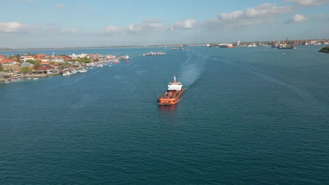 Empty Ship Heads For Open Waters After Leaving Benoa Port Bali Indonesia Drone Stock Footage 336564047