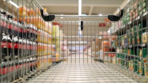 Empty shopping cart moving through supermarket Stock Footage 294993333