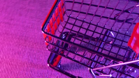 Empty shopping cart rotating on a board Video stock 249696973