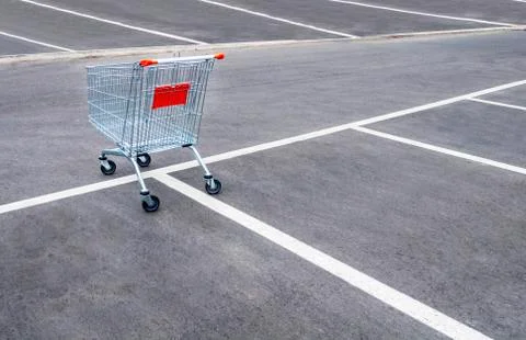 Empty shopping carts on a empty parking lot Stock Photos