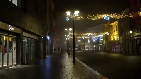 Empty shopping street by night Stock Footage 145156597