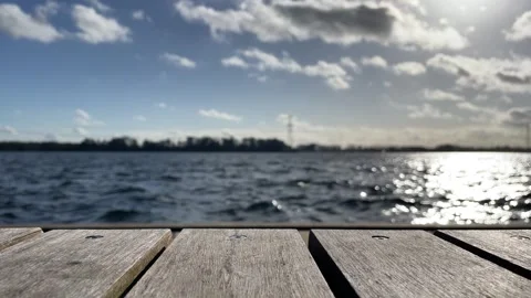 Empty shot, wooden flat and lake in a sunny day, vacation, peaceful, Video stock 255227060
