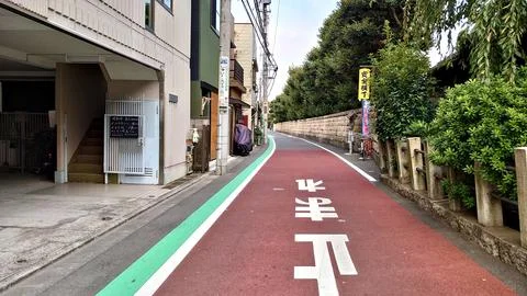 An empty side road with road markings Foto stock