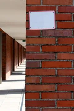 Empty Sign on Brick Wall Foto stock