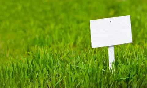 Empty sign on green grass Stock Photos