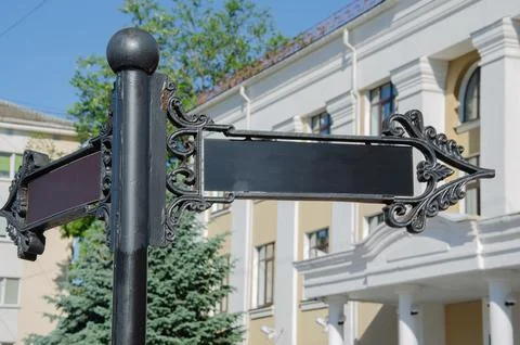 Empty sign pointer. A road sign for marking and placing information. Template Stock Photos