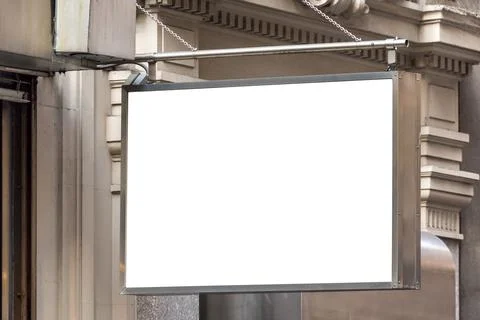 Empty signboard on a building with classical architecture. Blank store signage Stock Photos