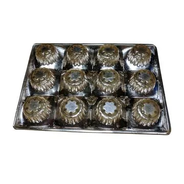 Empty silver chocolate box tray white background Fotos Stock