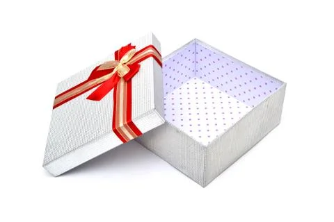 Empty silver gift box with red ribbon Stock Photos