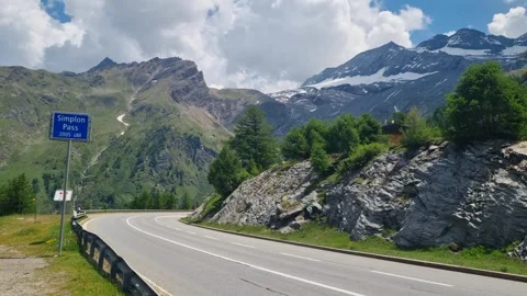 Empty Simplon Pass road in Valais, Switzerland, featuring the official street Stock Footage 340943364
