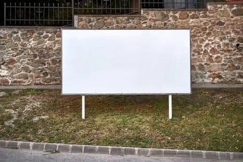 Empty singboard by a road Stock Photos
