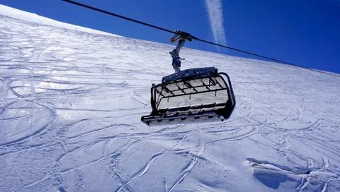 Empty ski cable car at snow mountains Titlis Stock Photos
