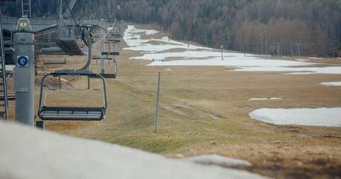 Empty ski resort with no snow in a bad season Stock Footage 129403662