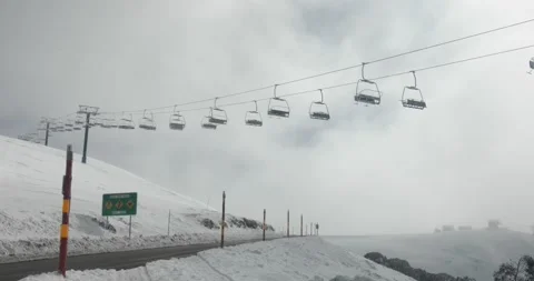 Empty Ski Resort Road and Chairlift During Winter Covid 19 Shutdown Video stock 137847177