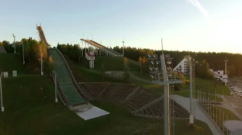 Empty ski resort in the summer time, sun lowering Stock Footage 68943175