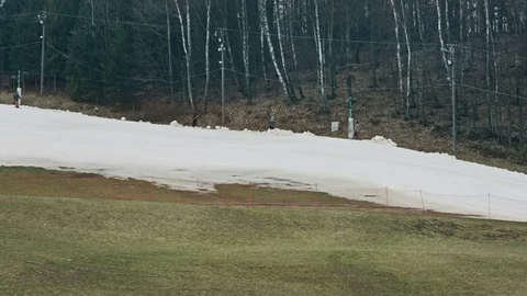 Empty ski slope with melting snow Stock Footage 69938372