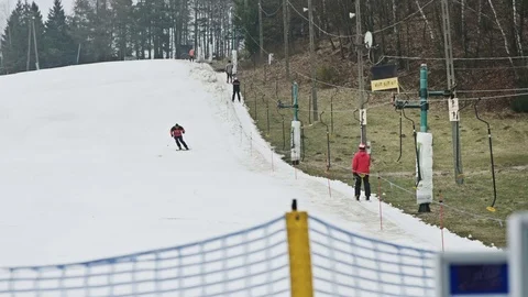 Empty ski slope with melting snow Stock Footage 69938774