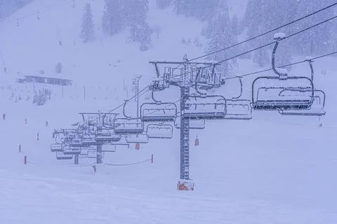 Empty ski slopes and ski lifts in Auron ski resort, France. During the winter Stock Photos
