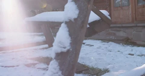 Empty Snow-Covered Swing in Sunny Winter Garden. 4K DCi SLOW MOTION 120 fps. 動画素材 67218838