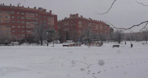 Empty snowy urban square with apartment buildings Stock Footage 327792799