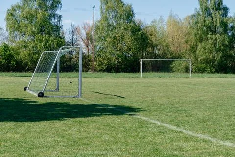 Empty Soccer Field with Separated Goalposts Foto stock