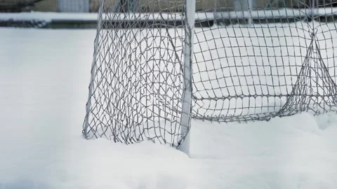 Empty Soccer Goal in Snowy Winter Landscape 動画素材 340483516