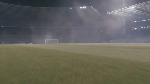Empty soccer pitch, dynamic movement towards the goal, bit of smoke 스톡 동영상 134569836