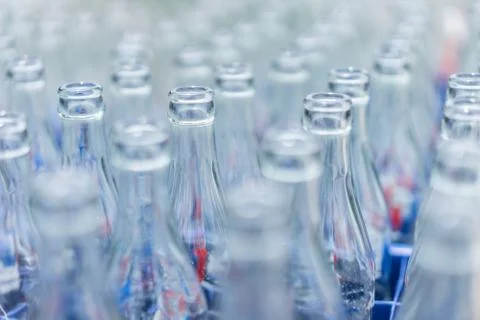 Empty soft drink bottles are kept neatly in the restaurant. Stock Photos