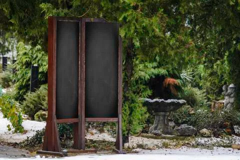 Empty space for copy black board on green texture background. Stock Photos