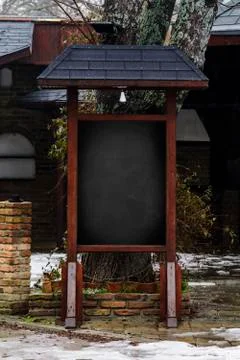 Empty space for copy black board on red brick wall texture background. Stock Photos