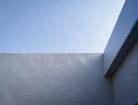 The empty space at the corner of the concrete building creates a composition  Stock Photos