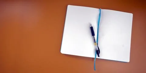 Empty Space of note book and a pen Stock Photos