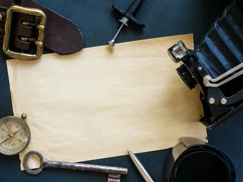 Empty space on old paper and attributes for adventure and travel in vintage Stock Photos