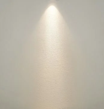 Empty space rough wall with spot lighting in gray background. Stock Photos