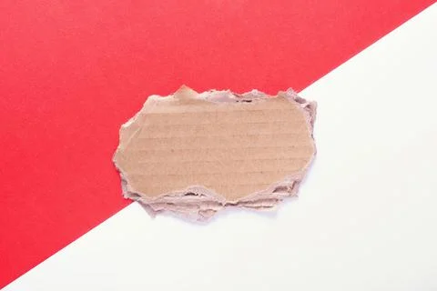 Empty space for text made of cardboard on a red and white background Stock Photos