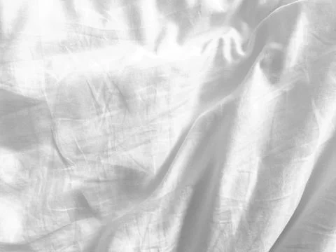 The empty space of this white fabric background offers a clean slate for de.. Stock Photos