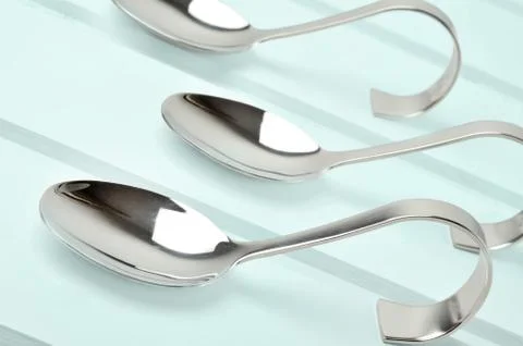 Empty spoon on table Stock Photos